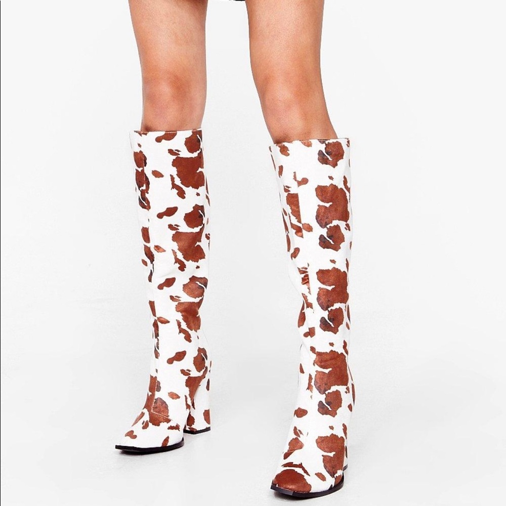 Super trendy cow print heeled boots!!